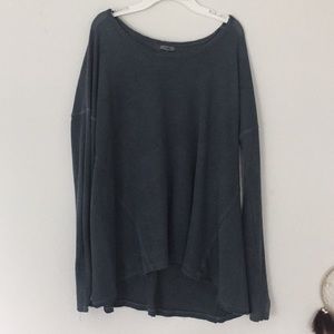 A dark vintage blue sweater